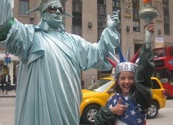 Big Kid in the Big Apple: Abby (right) posing with the “Statue of Liberty” // © 2011 Lisa Mcelroy; Terraxplorer Big Kid in the Big Apple: Abby (right) posing with the “Statue of Liberty” // © 2011 Lisa Mcelroy; Terraxplorer